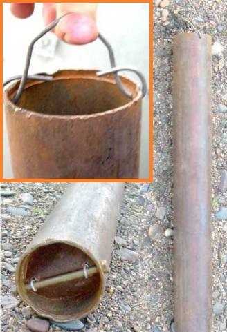 Écope faite maison avec une valve d'une bouteille en plastique