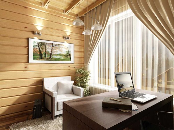 Bureau d'affaires dans une maison en bois. C'est douillet, calme à l'intérieur, rien de superflu, l'intérieur se dispose à travailler