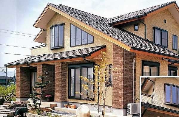Cette maison est également revêtue à l'extérieur de dalles en fibrociment.