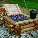 Une idée intéressante pour un parterre de fleurs haut - un puits est fait de bouts de bûches