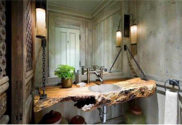 Cette salle de bain est dans le style à la jonction du loft et de l'éco