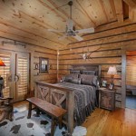Chambre dans une maison de campagne en bois de style campagnard