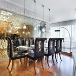 Cloison en verre avec un motif doré - une idée chic pour une spacieuse cuisine-salon combinée
