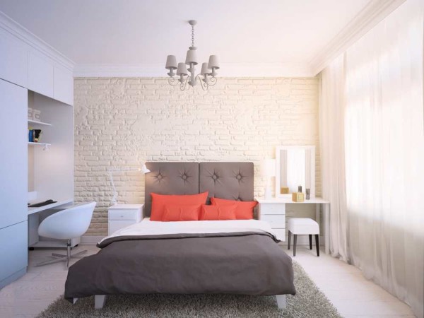 Une solution intéressante: une armoire avec un mur plein et un lieu de travail y est alloué