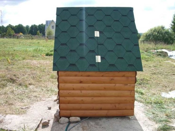 Maison fermée pour un puits