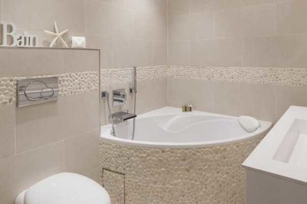 Baignoire d'angle - plus compacte