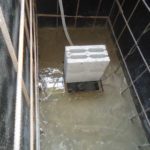 Béton, caisson écrasé par une charge