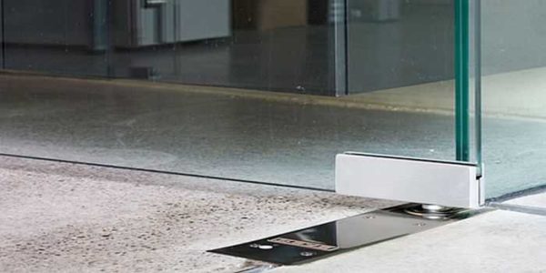 Ressort de plancher pour portes en verre