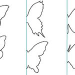 Les motifs de papillons en papier pour la décoration intérieure sont réalisés en deux. Le second est obtenu automatiquement après avoir tourné un morceau de papier plié en deux