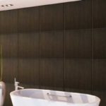 Voici à quoi ressemble le mur après avoir fini avec des panneaux muraux carrelés.