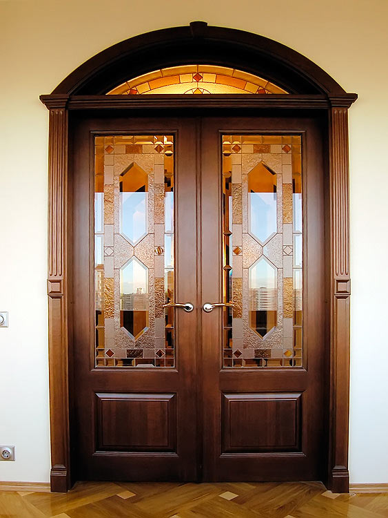 Porte intérieure en bois cintrée